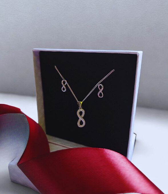 Серебряный комплект с символом бесконечности и цирконами